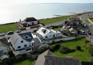 Aerial view of Southbourne Coast seaside property following architectural alterations.