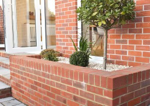 Stepped brick extension detail with new patio and landscaping at Southampton property.