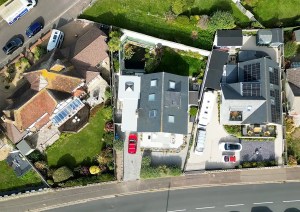 Top-down aerial view of the extended seaside property at Southbourne Coast.