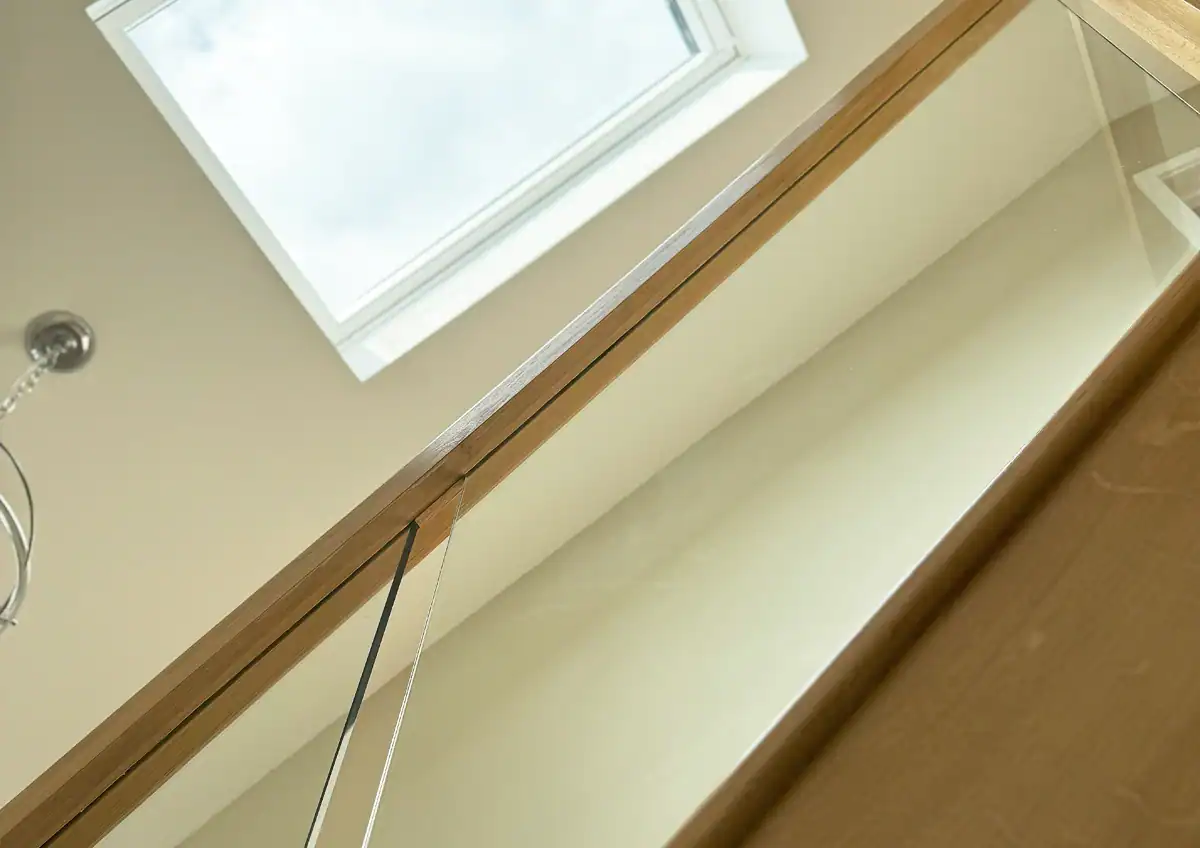Skylight positioned above the staircase flooding the interior with natural light.