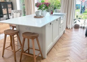 Modern kitchen island with breakfast bar inside Bournemouth home extension.