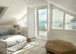 Interior space within the glazed ground floor extension at Southbourne Coast property.