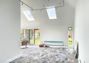 Minimal white interior of gallery-style home extension in Poole.