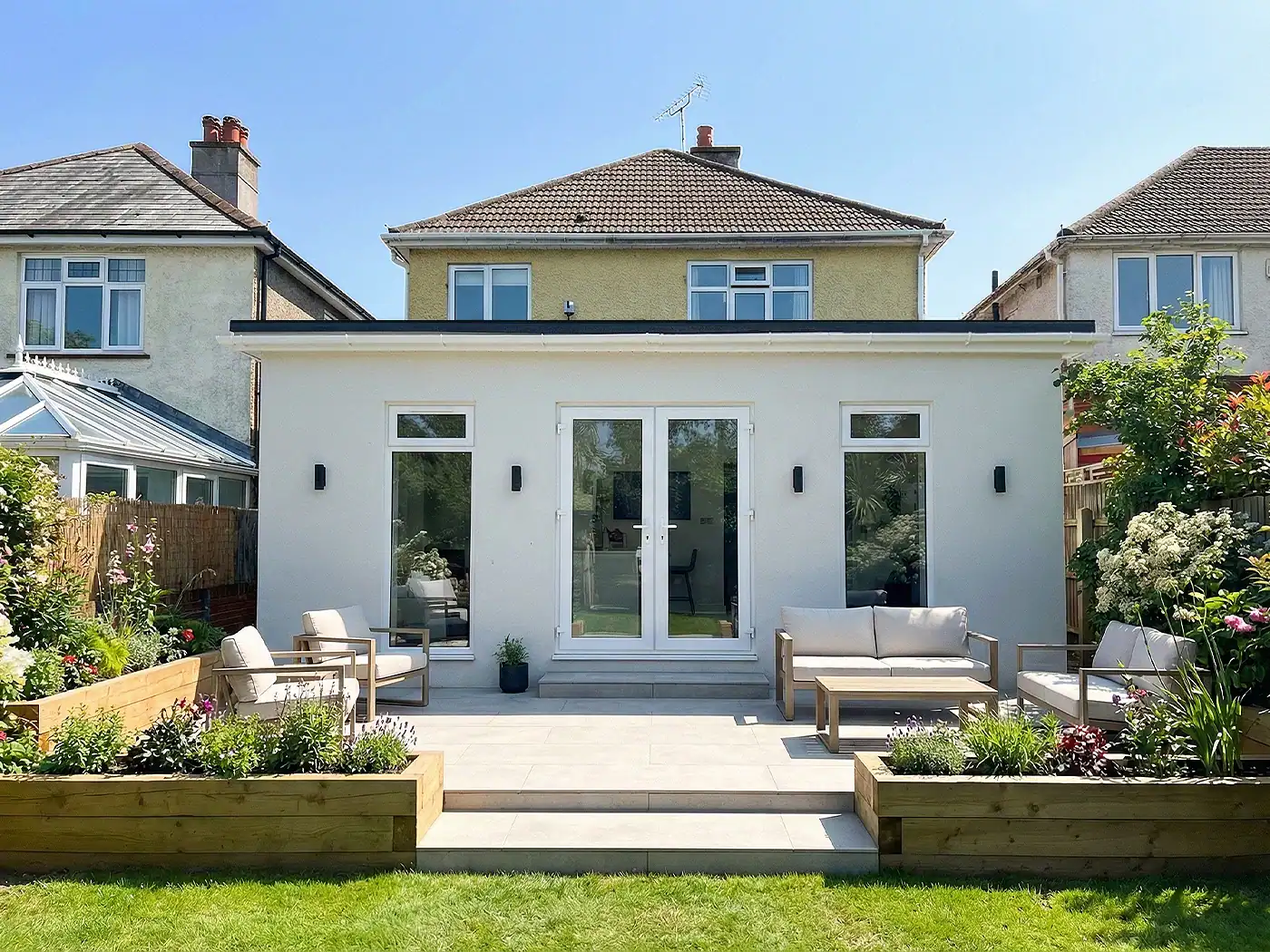Exterior rear view of a flat roof home extension at Corhampton Road, Bournemouth.