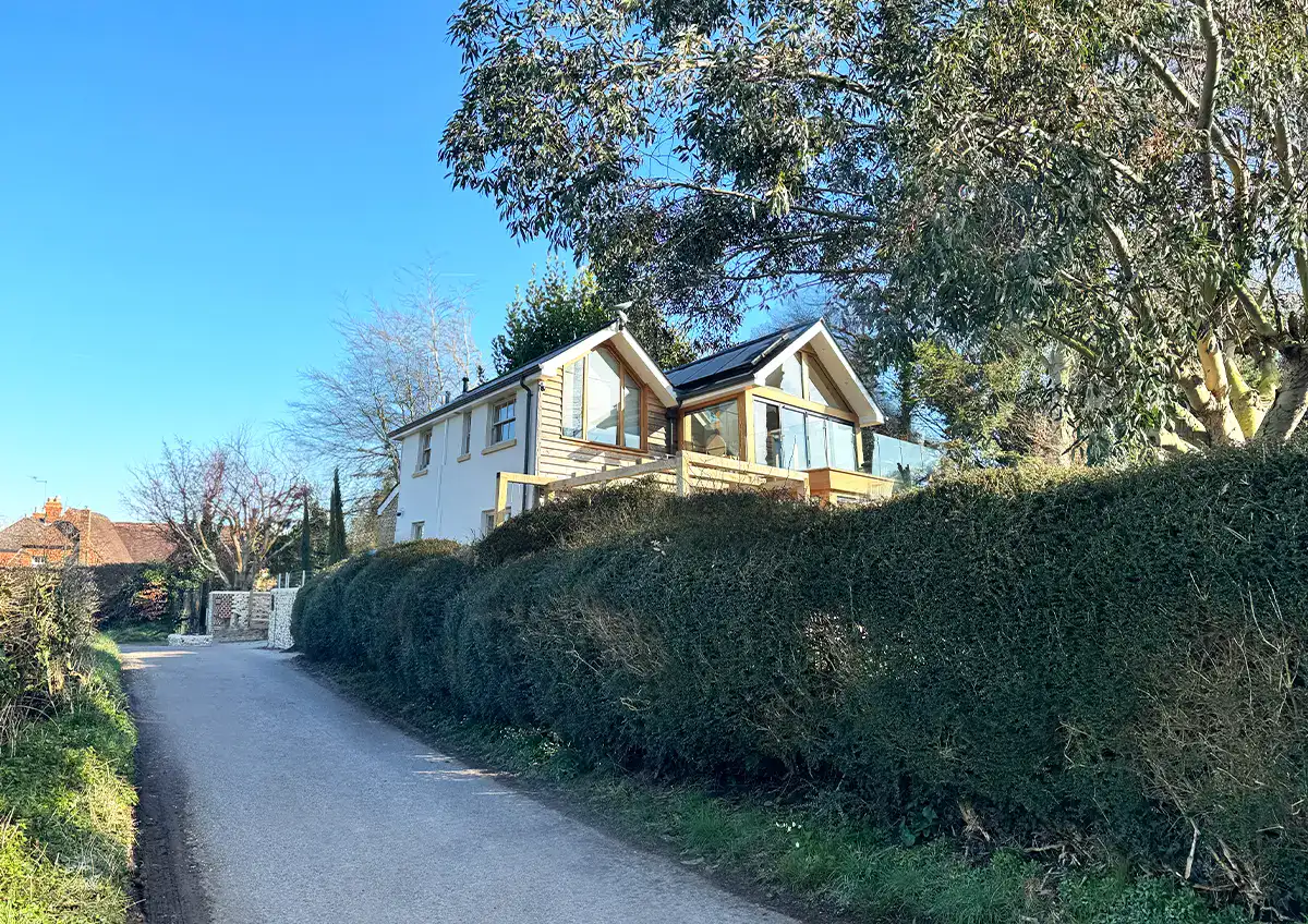Exterior view of The Cottage new build home with pitched roof and traditional design.